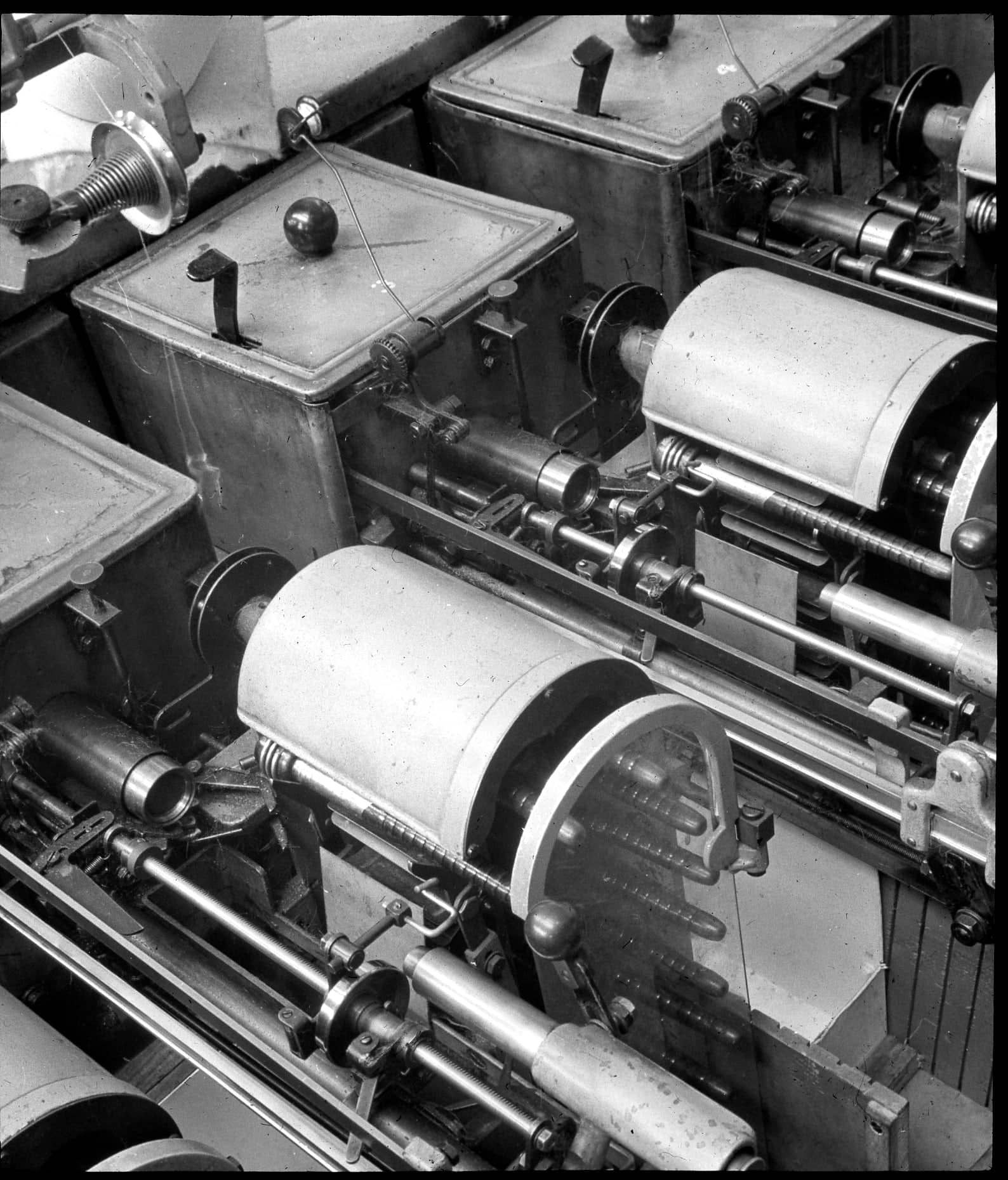 Black and white view of automatic winding machinery